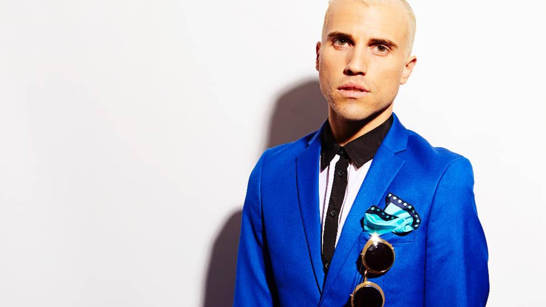 Tyler Glenn, frontman of the band Neon Trees, poses for a portrait to promote the band's upcoming third album, "Pop Pyschology," on Tuesday, April 22, 2014 in New York. (Photo by Dan Hallman/Invision/AP)
