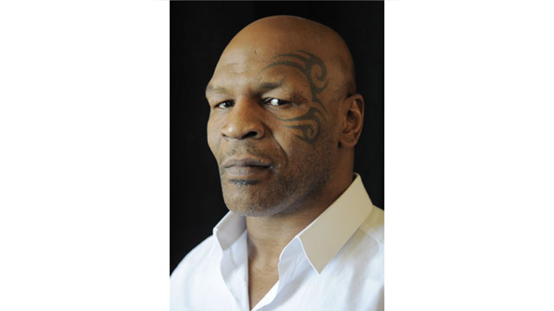 FILE - In this July 25, 2013, file photo, boxer MIke Tyson poses backstage during HBO's Summer 2013 TCA panel at the Beverly Hilton Hotel in Beverly Hills, Calif. (AP Photo)