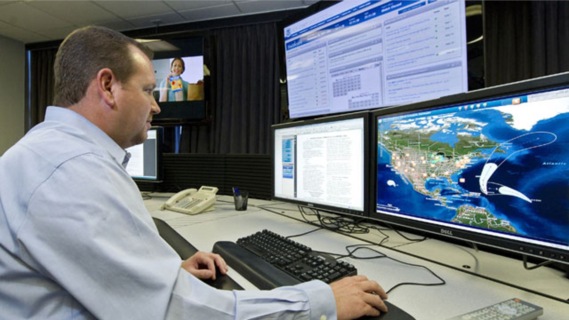 Sept. 29, 2011: A cyber security analyst works in the "watch and warning center" during the first tour of the government’s secretive cyber defense lab.