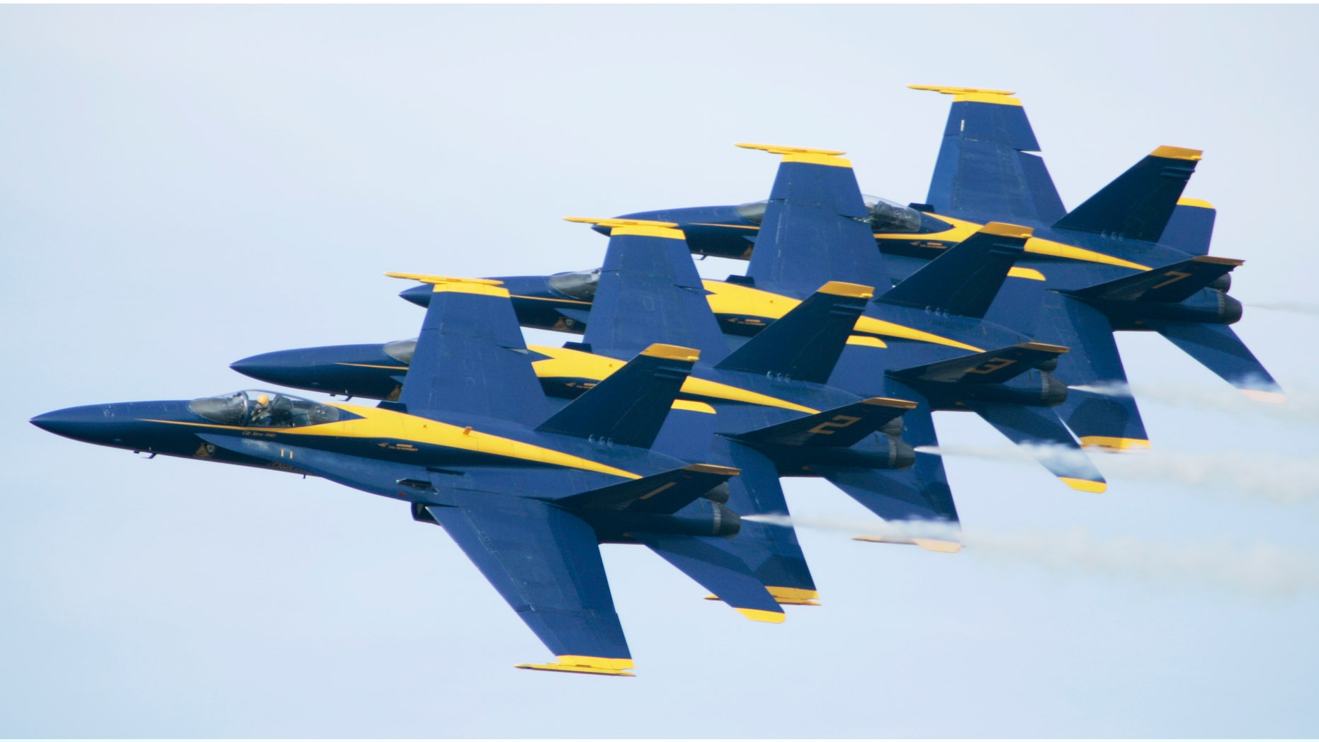 FILE: Members of the U.S. Navy Blue Angels precision flying team rehearse at Little Rock Air Force base in Jacksonville, Ark.