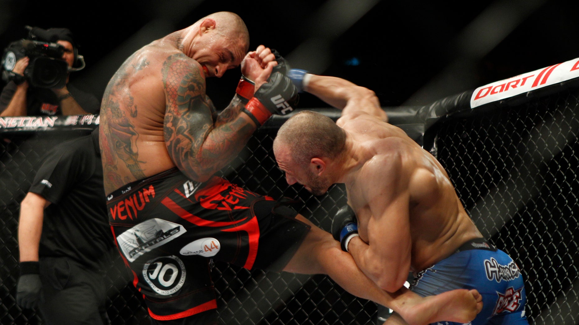 Nov. 10, 2012: In a file photo, Thiago Silva of Boca Raton, Fla., left, fights with Stanislav Nedkov of Bulgaria during the Light Heavyweight match of the Ultimate Fighting Championship UFC in Macau.