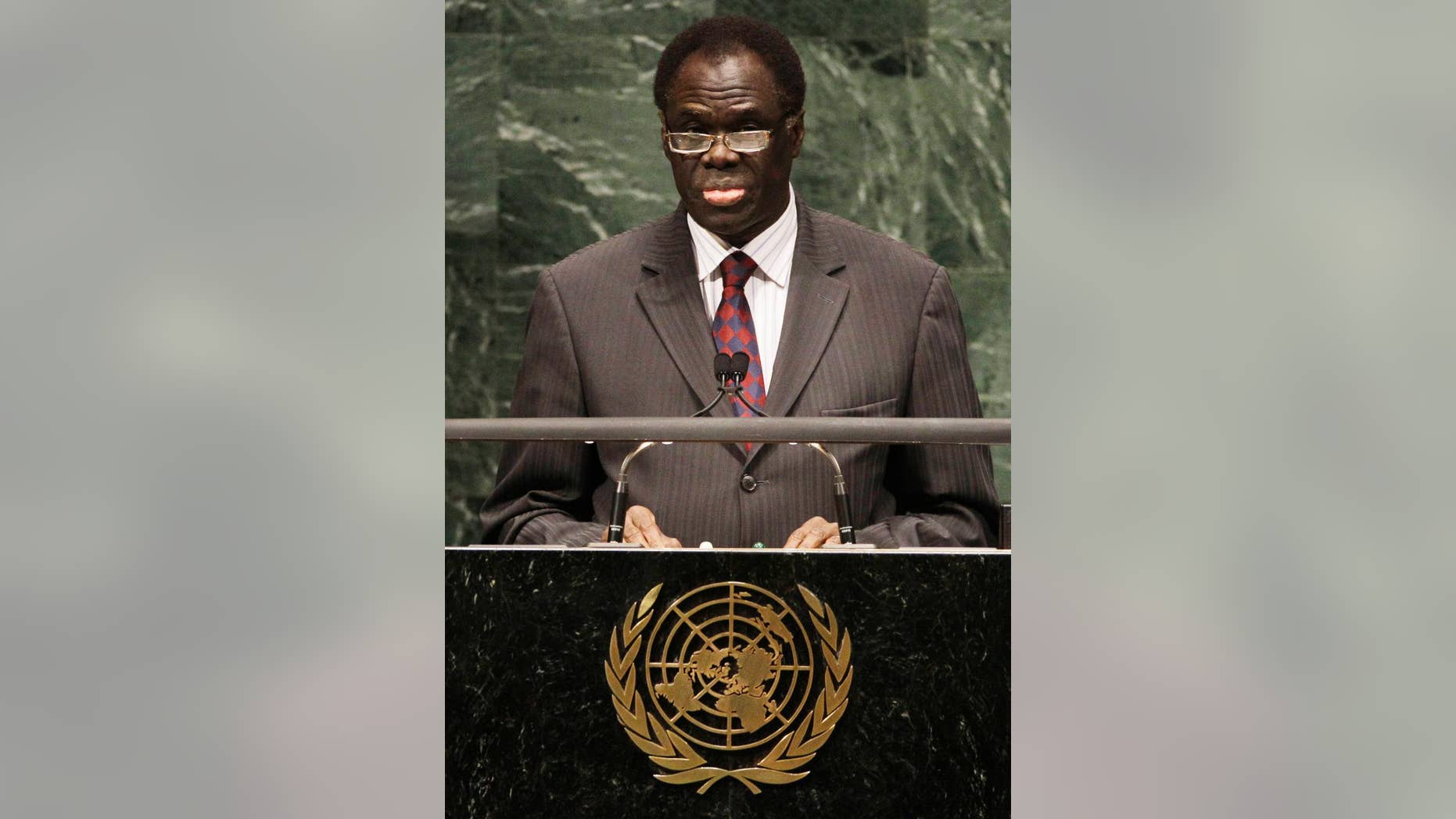 In this Tuesday, Sept. 28, 2010, photo Michel Kafando, Chairman of the Delegation of Burkina Faso addresses the 65th session of the United Nations General Assembly at U.N. headquarters in New York. Burkina Faso's former ambassador to the United Nations is slated to be in charge of a civilian transitional government after the military briefly seized control of the country last month. Michel Kafando, 72, was named early Monday, Nov. 17, 2014, as transitional president to lead Burkina Faso until elections a year from now. (AP Photo/Frank Franklin II)