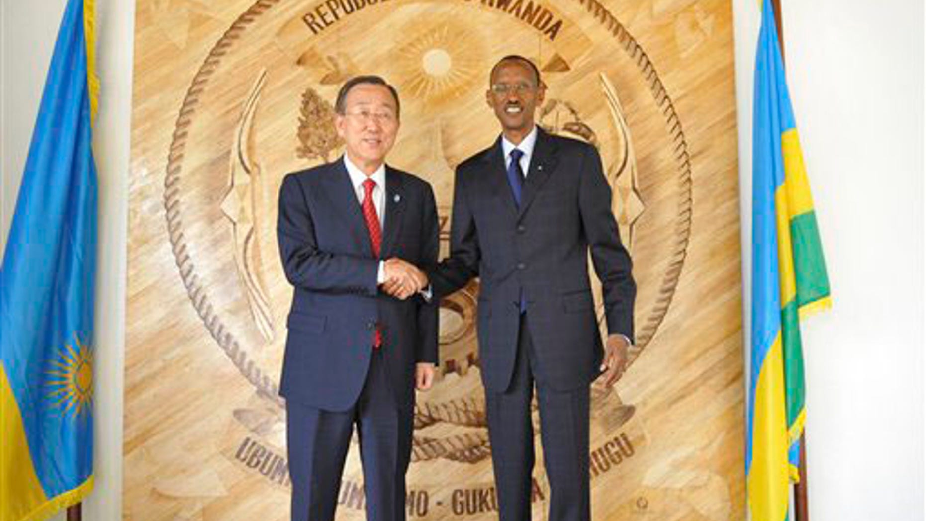 United Nations Secretary-General Ban Ki-moon, left, with Rwandan President Paul Kagame , right, in Kigali, Rwanda, Wednesday, Sept 8, 2010. Secretary-General Ban Ki-moon flew to Rwanda Tuesday to discuss the country's threat to withdraw its U.N. peacekeepers from Sudan if the United Nations publishes a report accusing Rwanda's army of possible genocide in the 1990's. The joint U.N.-African Union peacekeeping mission in Darfur is commanded by a Rwandan, Lt. Gen. Patrick Nyamvumba, and the country has over 3,200 troops and 86 police in the nearly 22,000-strong force. U.N. officials and diplomats have said a Rwandan pullout from Darfur would be a major blow at a time of increasing violence and fresh efforts to end the seven-year conflict.
