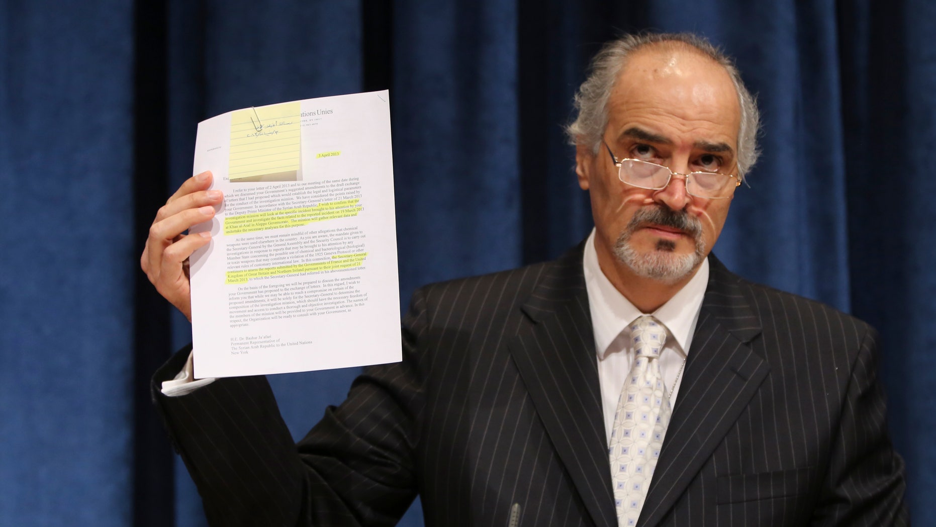 April 30, 2013: Bashar Ja'afari, Syria's U.N. ambassador, gestures as he speaks during a news conference, at United Nations headquarters.