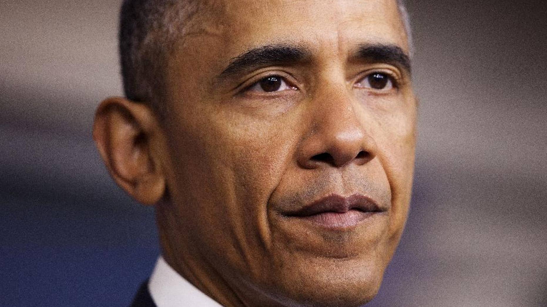 FILE - In this April 23, 2015 file photo, President Barack Obama pauses while speaking in the Brady Press Briefing Room of the White House in Washington, where he took full responsibility for deaths of American, Italian hostages, expresses apologies. The accidental killing of two hostages in a U.S. counterterrorism operation against al-Qaida has raised pressure on the White House to revise the nation’s oft-criticized strategy for dealing with abducted Americans. A day after President Barack Obama apologized and took responsibility for the deaths of American Warren Weinstein and Italian Giovanni Lo Porto, administration officials said Friday that a nearly yearlong, interagency review of the policy is to be completed this spring. (AP Photo/Pablo Martinez Monsivais, File)