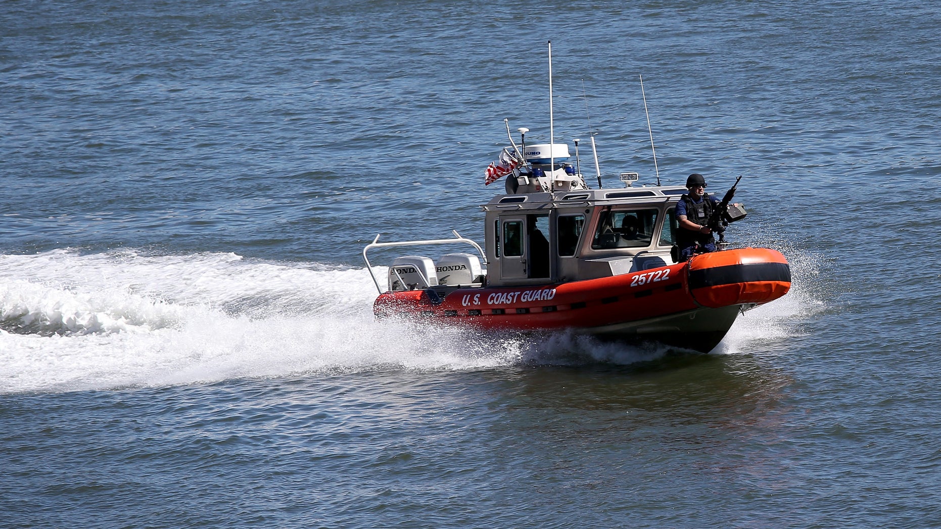 NEW YORK, NY - SEPTEMBER 23: A U.S. Coast Guard boat patrols the East River near the United Nations building ahead of the 68th session of the General Assembly on September 23, 2013 in New York City. With an influx of foreign dignitaries visiting heavy security and multiple road closures in the city is expected for this week's 68th session of the General Assembly of the United Nations. (Photo by John Moore/Getty Images)