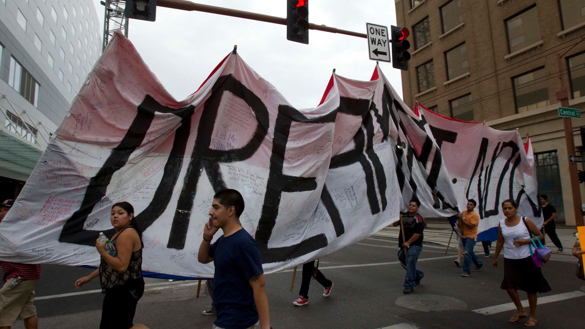 Aug. 15, 2012: Student protestors walk towards the Arizona Capitol in Phoenix after Gov. Jan Brewer issued an executive order.