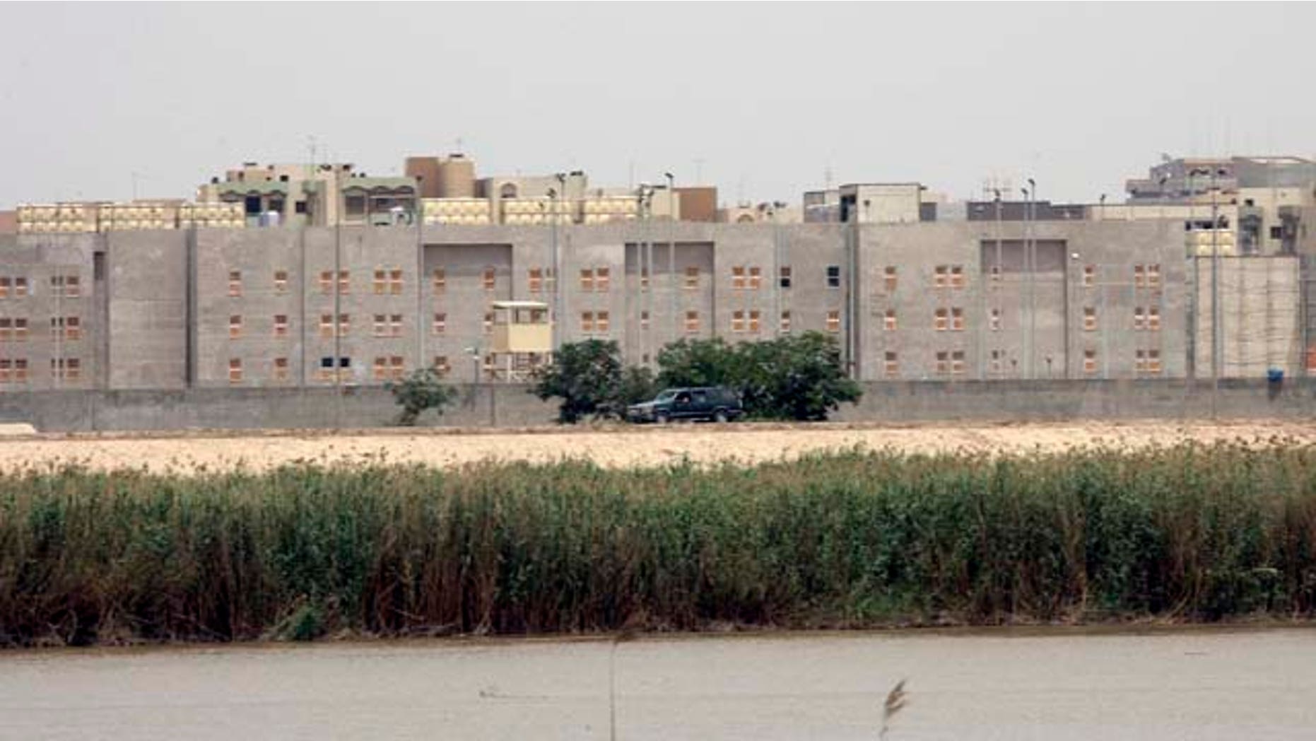 FILE - In this May 19, 2007, file photo, a portion of the new U.S. embassy under construction is seen from across the Tigris river in Baghdad. In 2014, by contrast, CIA officers have been largely hunkered down in their heavily fortified Baghdad compound since U.S. troops left the country in 2011, current and former officials say, allowing a once-rich network of intelligence sources to wither. (AP Photo)