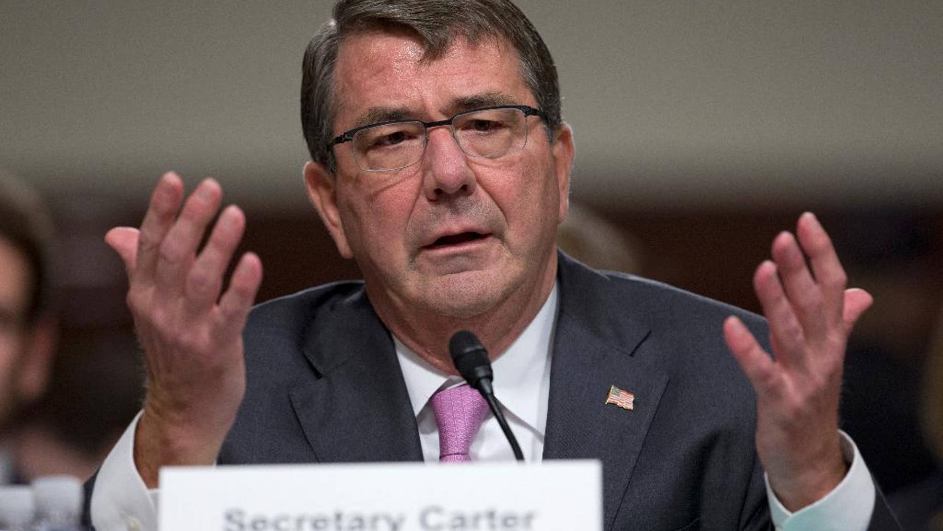In this photo taken July 7, 2015, Defense Secretary Ash Carter testifies on Capitol Hill in Washington. Carter left for Tel Aviv on Sunday to push ahead with talks on ways the U.S. can further improve Israel’s security _ not just with Iranian threats in mind, but an array of other challenges, including cyberdefense and maritime security. (AP Photo/Carolyn Kaster)