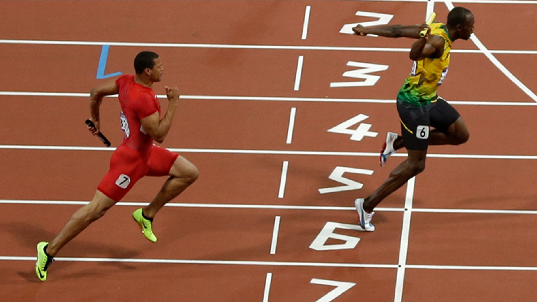Aug. 11, 2012: Jamaica's Usain Bolt crosses the finish line ahead of United States' Ryan Bailey to win the men's 4x100 relay at the London Olympics.