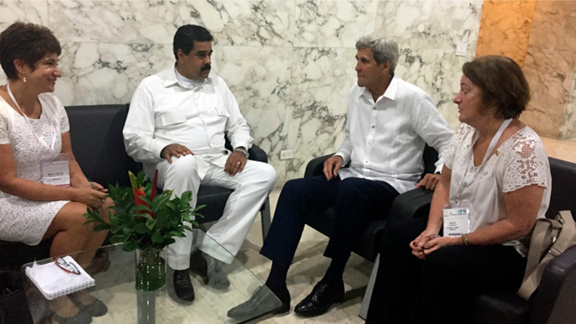 U.S. Secretary of State John Kerry meets with Venezuela president Nicolas Maduro in Cartagena, Colombia Monday, Sept. 26, 2016. (AP Photo/Vivian Salama)