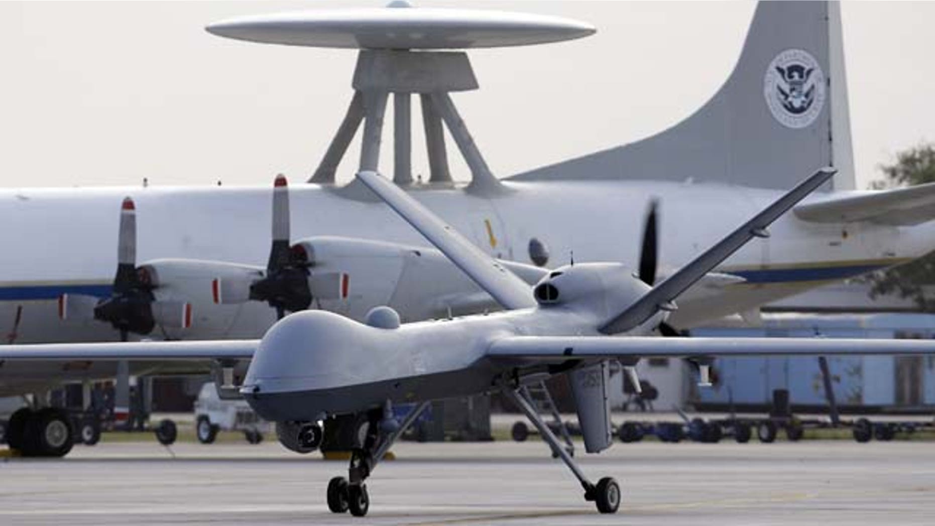 In this Nov. 8, 2011 file photo, a Predator B unmanned aircraft taxis at the Naval Air Station in Corpus Christi, Texas. (AP Photo)