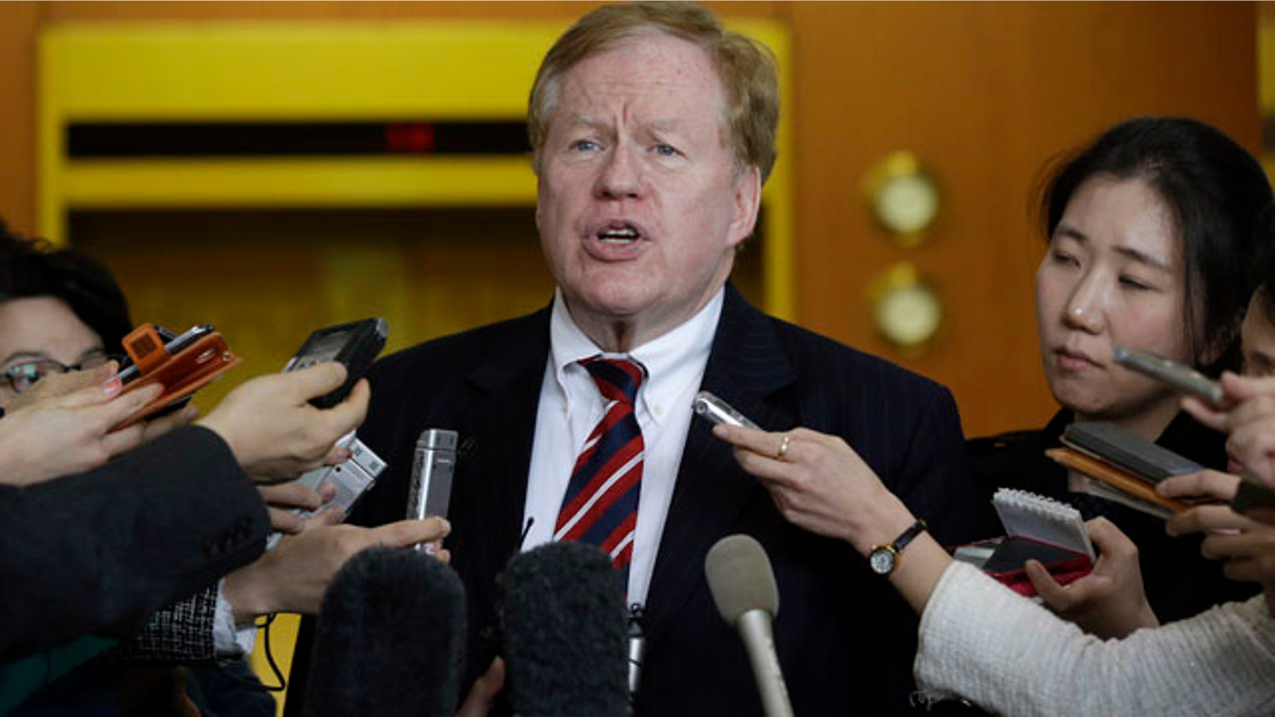 FILE - In this April 7, 2014, file photo, U.S. special envoy for North Korean human rights issues Robert King answers reporters' questions at the Foreign Ministry in Seoul, South Korea. (AP Photo/Lee Jin-man, File)