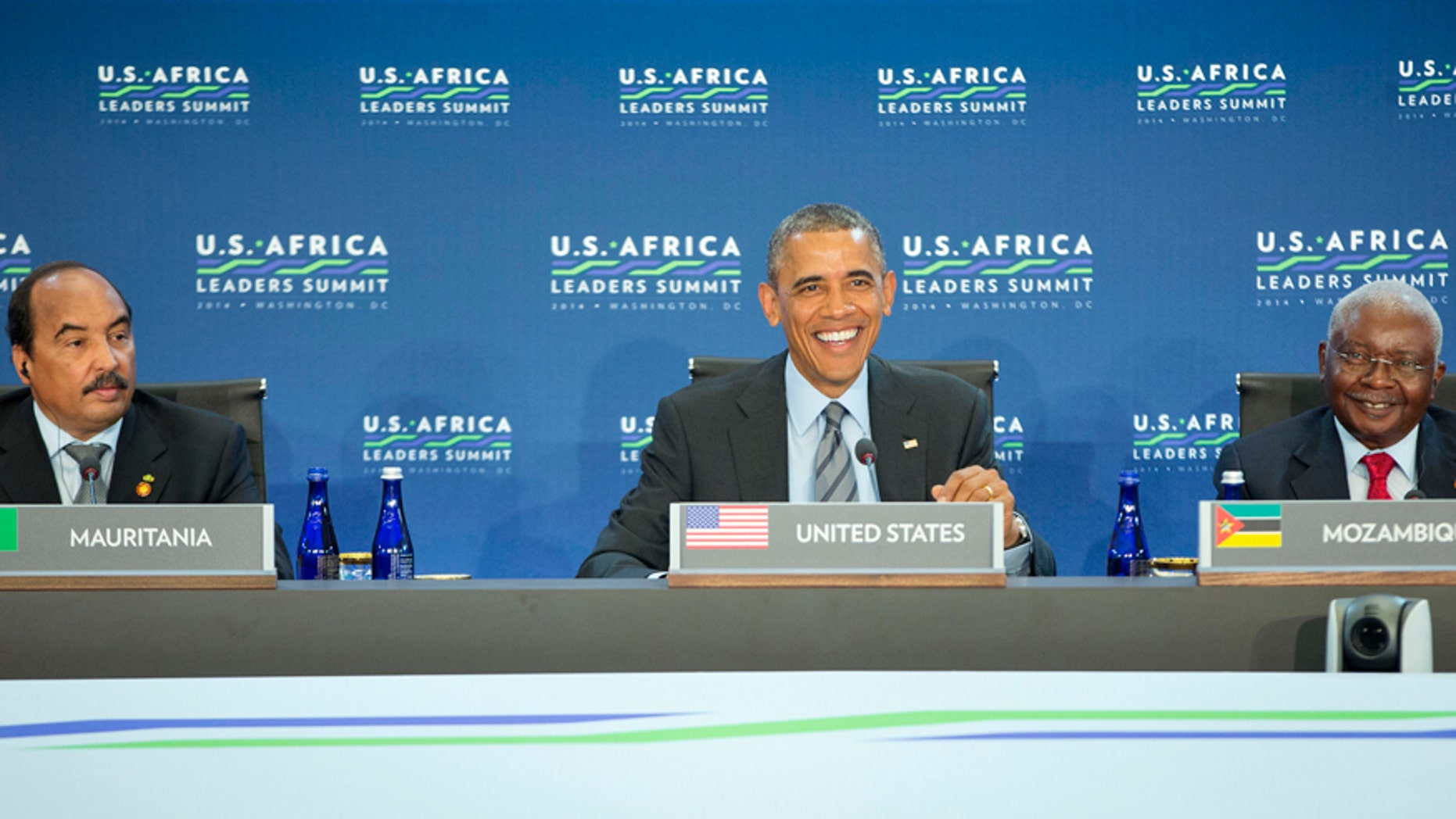 Aug. 6, 2014: President Obama, with President Mohamed Ould Abdel Aziz of Mauritania, left, and Mozambique's President Armando Emilio Guebuza, participates in the US African Leaders Summit at the State Department in Washington.