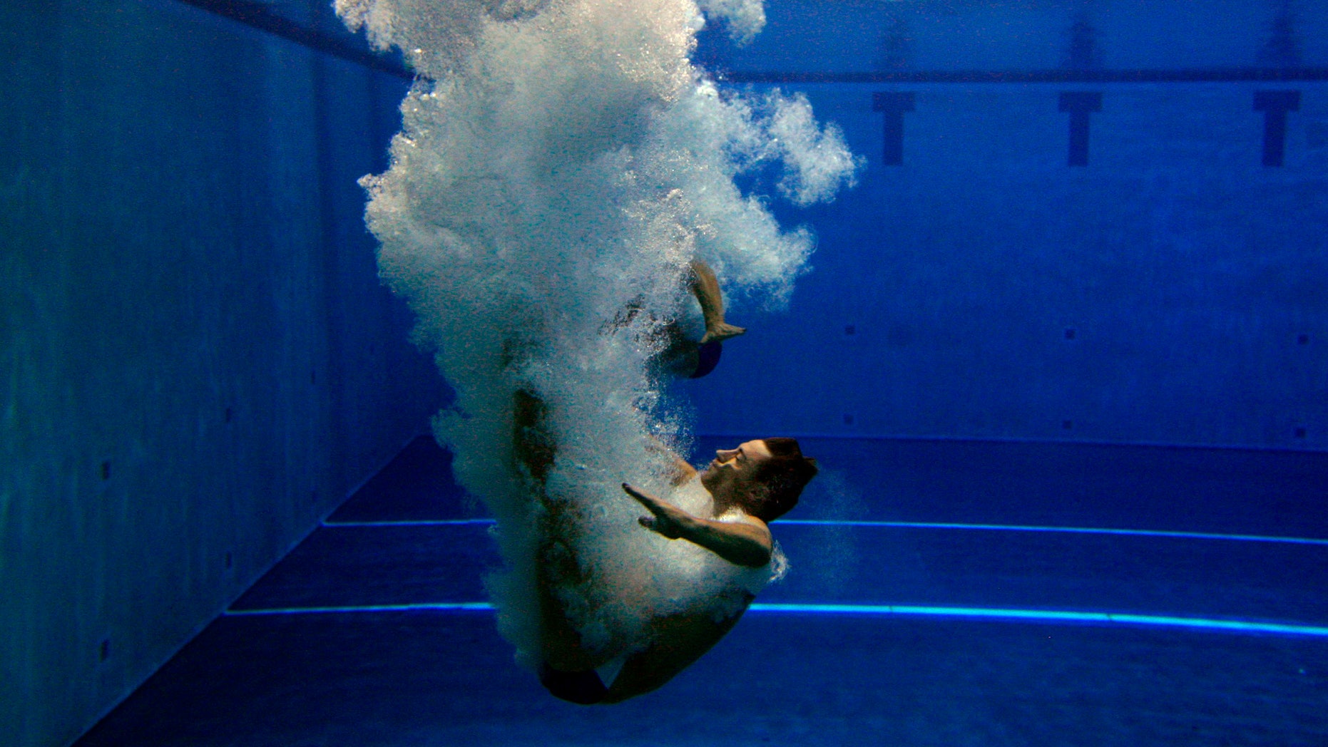 June 18, 2012: Participants warm up before the men's synchronized three-meter preliminary and women's synchronized 10-meter preliminary diving competitions at the U.S. Olympic team trials, at the King County Aquatic Center in Federal Way, Wash.