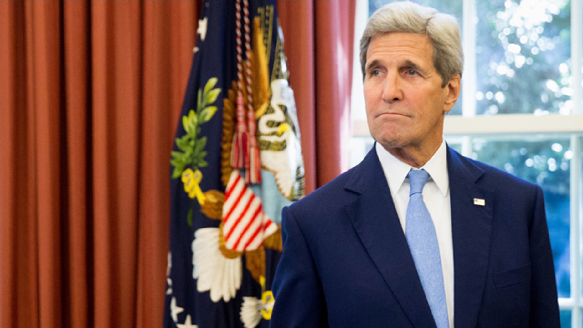 FILE - In this Sept. 15, 2015 file photo, Secretary of State John Kerry is seen in the Oval Office of the White House in Washington. (AP Photo/Andrew Harnik, File)
