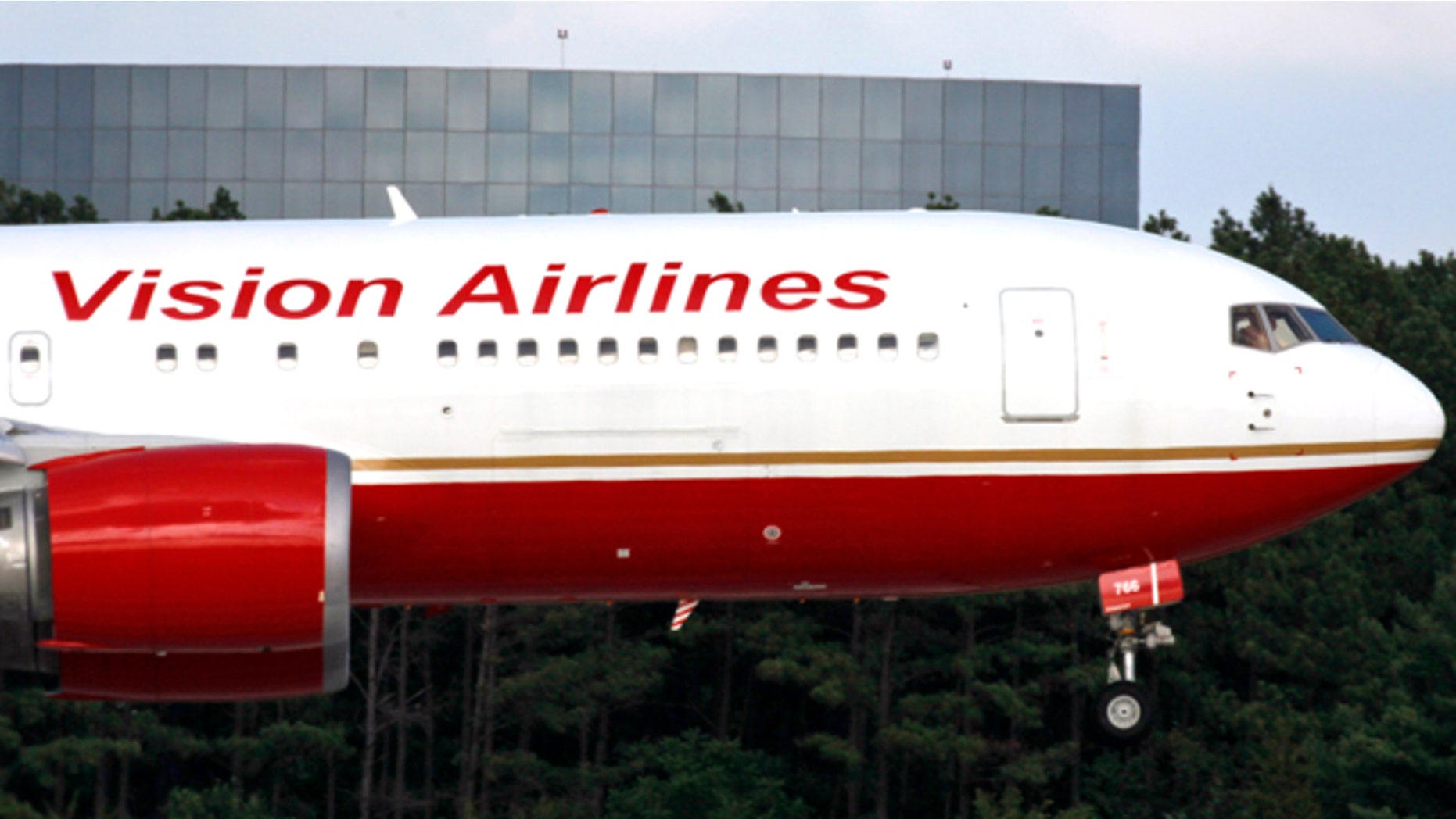 A plane, thought to be carrying the 4 Russians who were convicted for spying for the West, arrives at Dulles International Airport in Chantilly Va., Friday, July 9, 2010