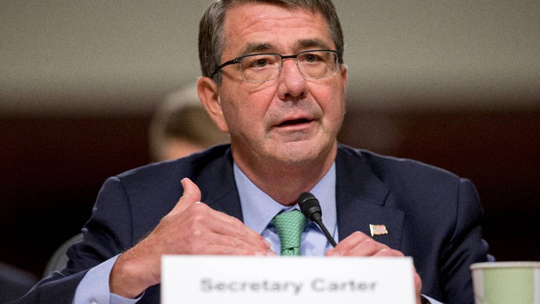 FILE - In this July 29, 2015, file photo, Defense Secretary Ash Carter testifies on Capitol Hill in Washington. The murky aftermath of the attack on Syrian rebels last week by al-Qaida-linked militants has raised questions about how the small, ragtag group of U.S.-trained forces was sent into battle and whether the military needs to make adjustments to the program. (AP Photo/Andrew Harnik)