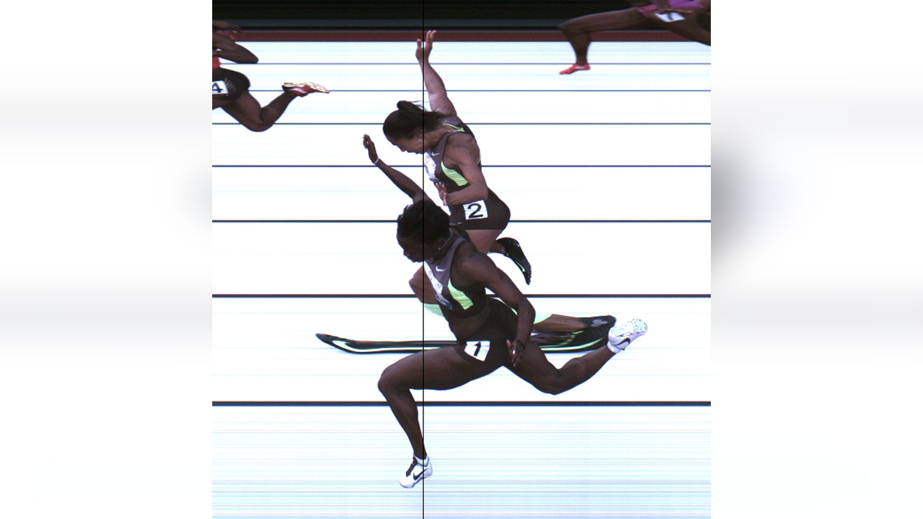 This Saturday, June 23, 2012, photo provided by USA Track & Field shows the third-place finish of the women's 100-meter final from a photo-finish camera, shot at 3,000-frames-per-second, during the U.S. Olympic Track and Field Trials in Eugene, Ore.