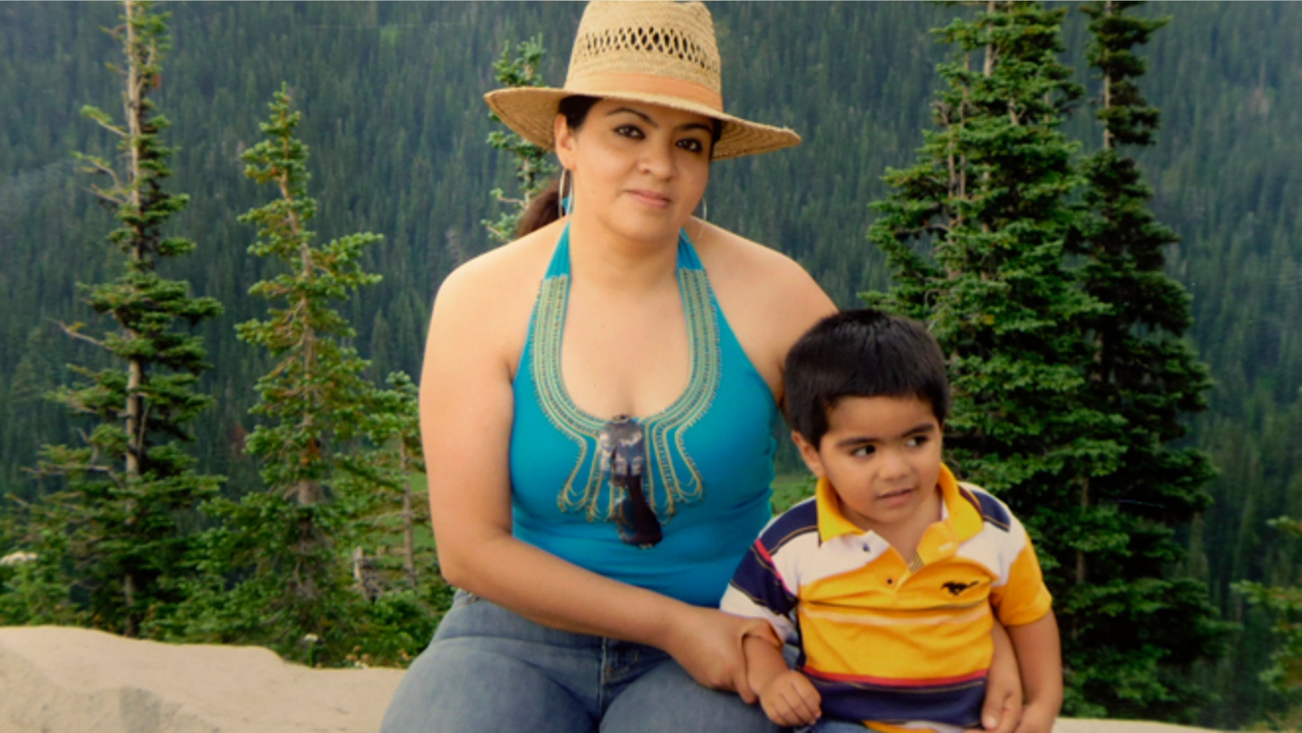 This 2009 family photo provided by Grisel Rodriguez shows Nestora Salgado, who has been detained since she was arrested Aug. 21, 2013 in the state of Guerrero, south of Mexico City, where she had been leading a vigilante group targeting police corruption and drug cartel violence. At right is her grandson, Cristian Rodriguez, who she was raising at the time the photo was taken. (AP Photo/Courtesy Grisel Rodriguez)