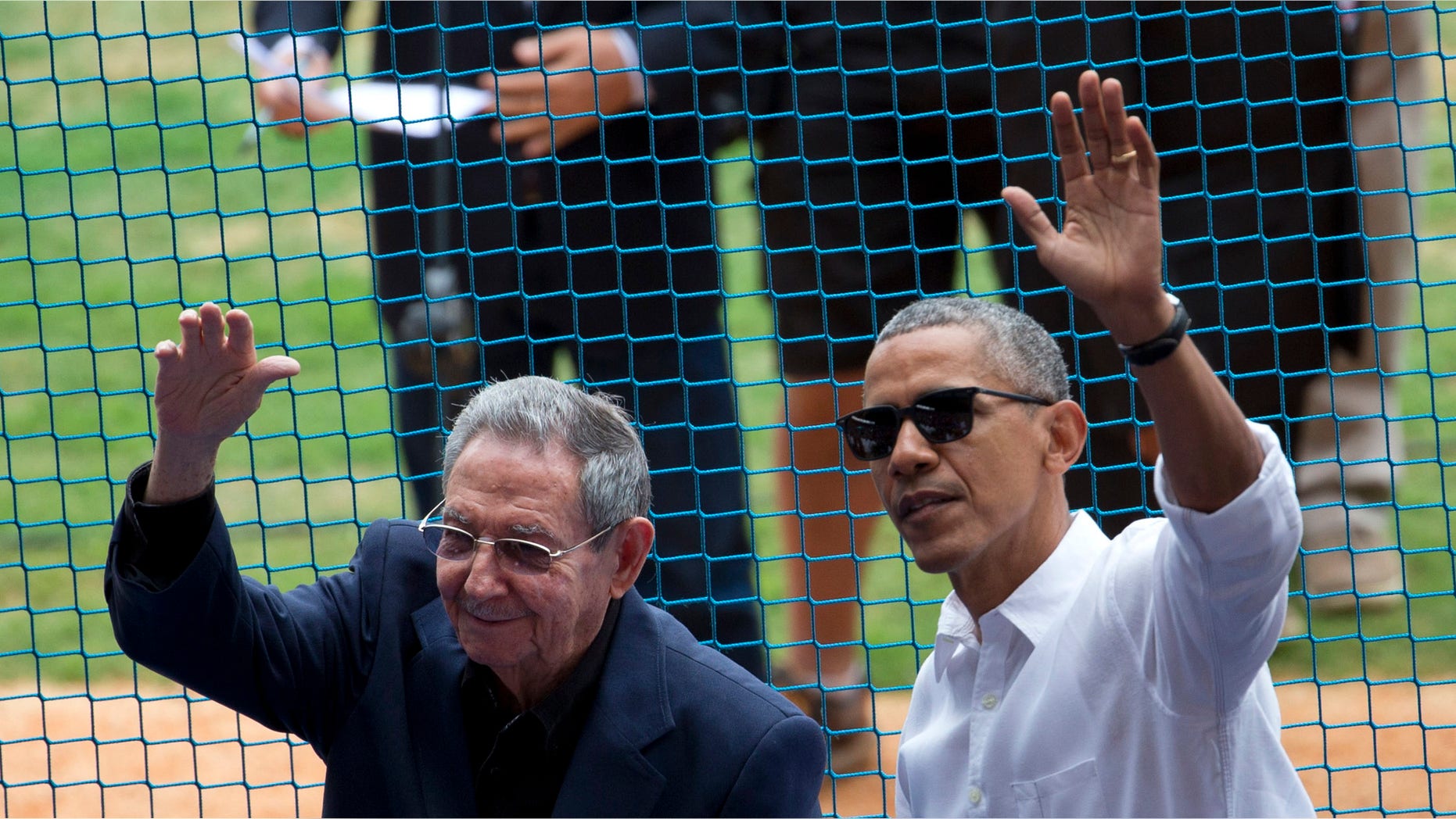FILE - This March 22, 2016 file photo shows U.S. President Barack Obama, right, and his Cuban counterpart Raul Castro wave to cheering fans as they arrive for a baseball game between the Tampa Bay Rays and the Cuban national baseball team, in Havana, Cuba. Castroââ¬â¢s passing removes what was long the single greatest psychological barrier to a warmer U.S.-Cuban relationship. But it also adds to the uncertainty ahead with the transition from an Obama to Trump administration. (AP Photo/Rebecca Blackwell, File)