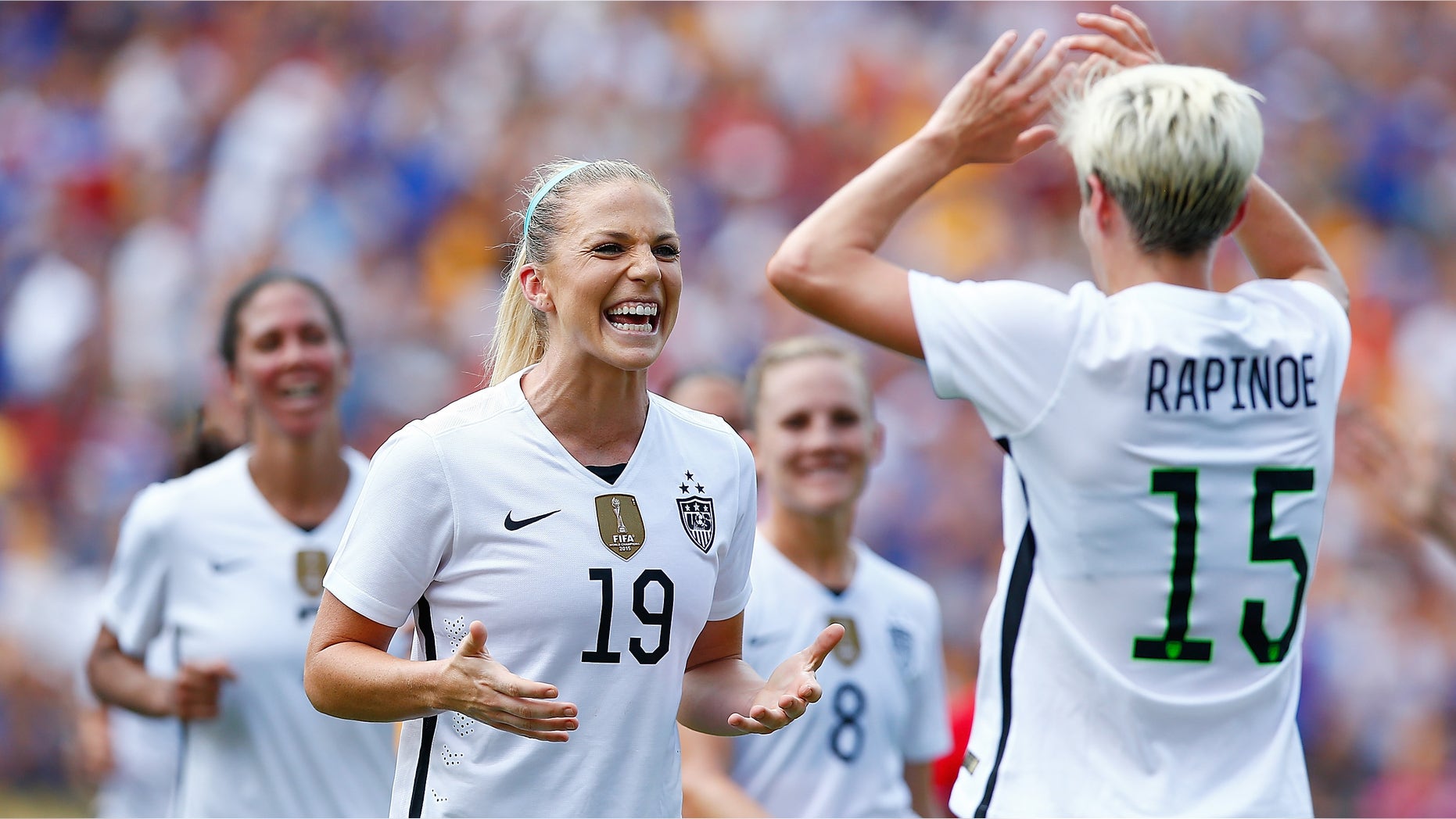 PITTSBURGH, PA - AUGUST 16: Julie Johnston #19 of the United States celebrates her goal with teammate Megan Rapinoe #15 in the first half against Costa Rica during the match at Heinz Field on August 16, 2015 in Pittsburgh, Pennsylvania. (Photo by Jared Wickerham/Getty Images)