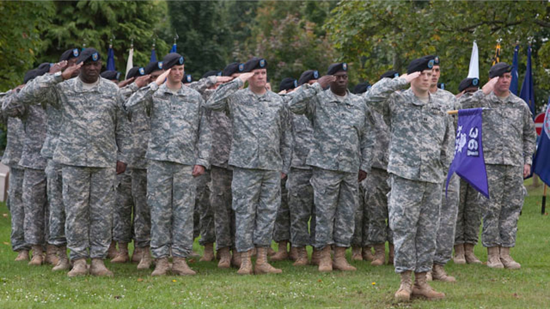 September 17: Soldiers of the US army salute at Daenner barracks in Kaiserslautern, Germany. The U.S. military says it has activated a new civil affairs brigade in Germany, the first of its type to be based in Europe. (AP)