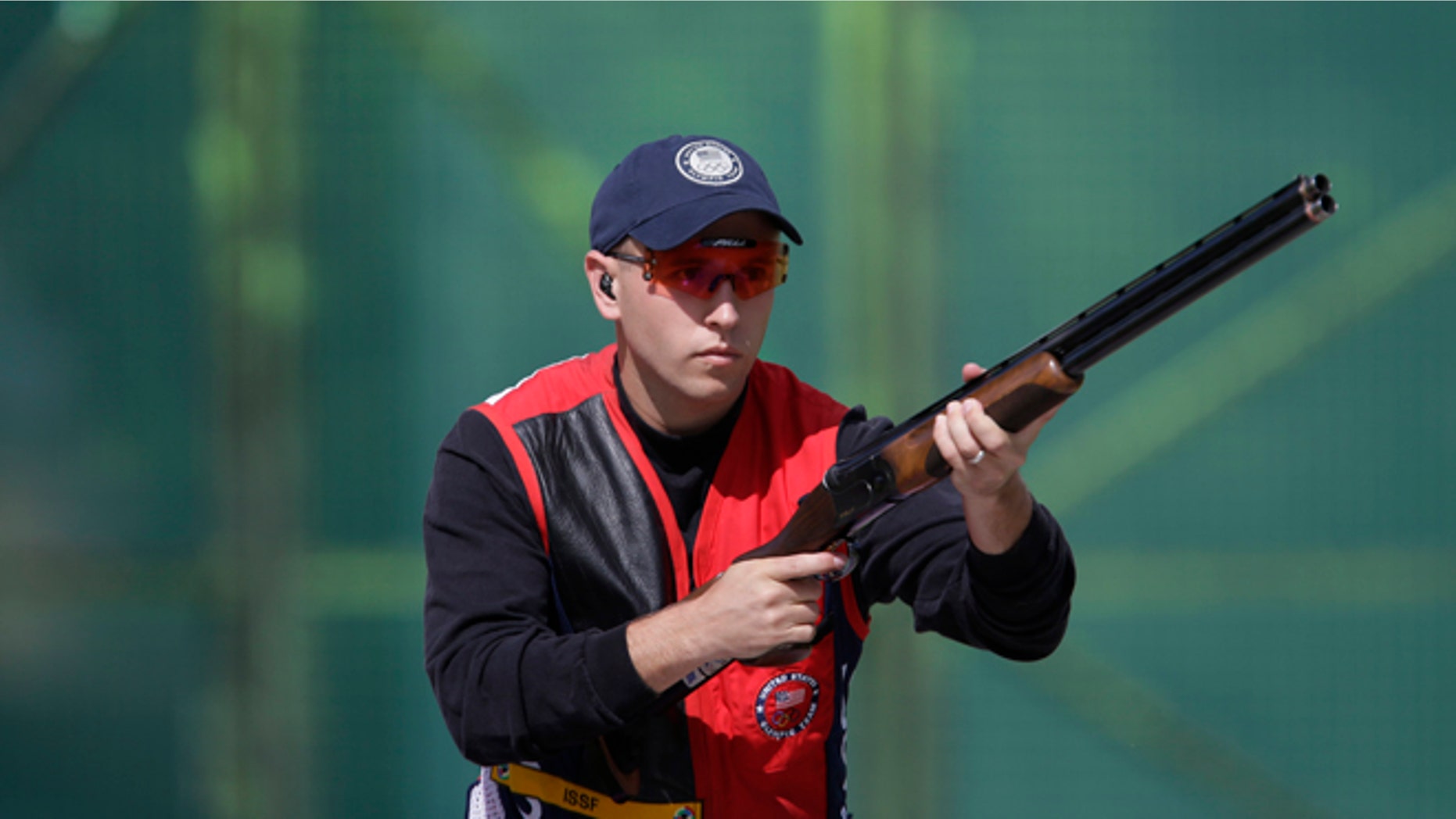 July 30, 2012: United States of America's Vincent Hancock prepares to shoot during the first day of qualifiers for the men's skeet event at the 2012 Summer Olympics in London.