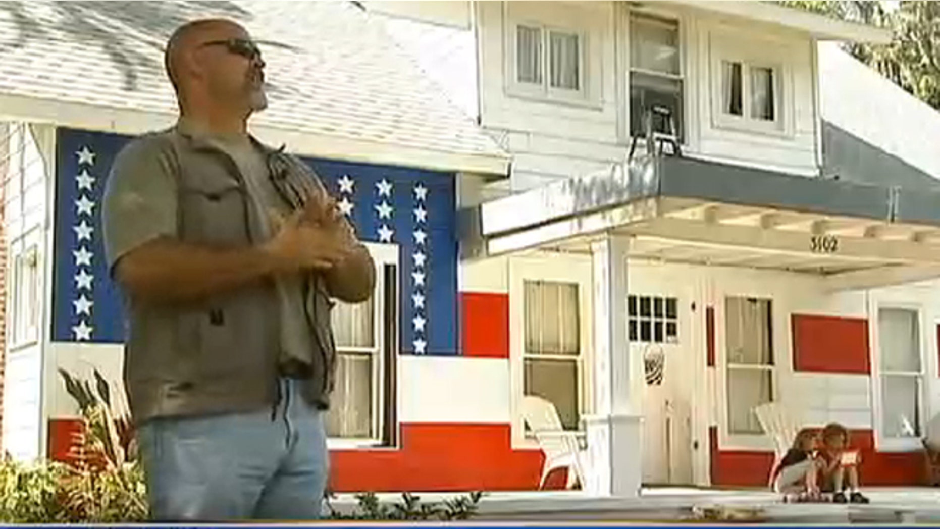 Brent Greer said he painted his Florida home red, white and blue to protest unfair fines.