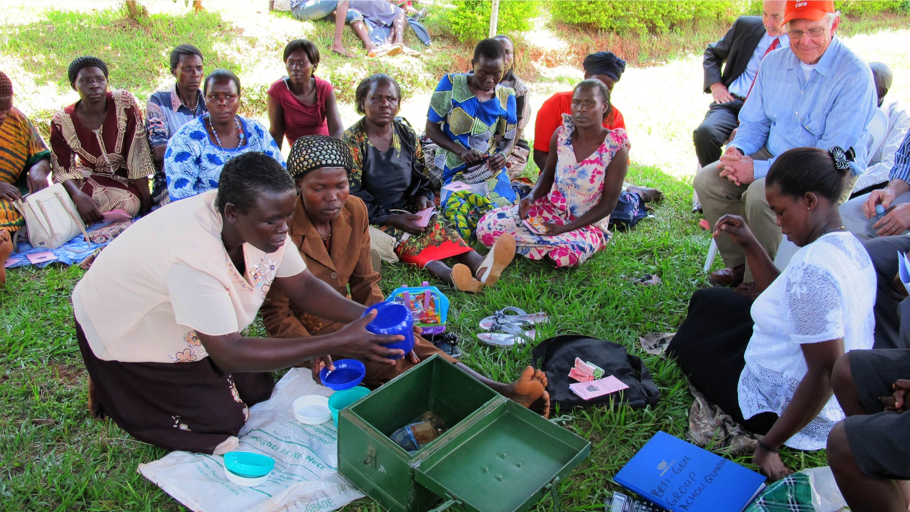 Women affected by AIDS share stories of survival at the Reach Out clinic on the outskirts of Kampala, Uganda.