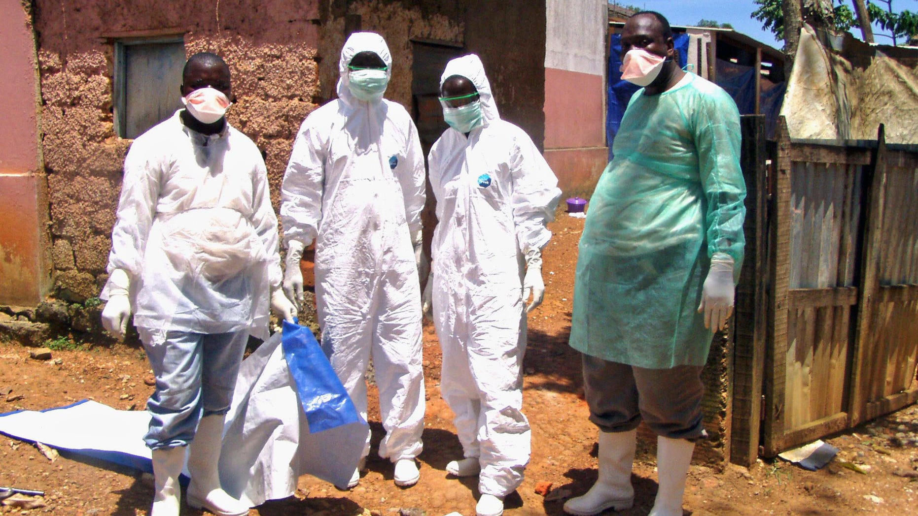 March 27, 2005: Medical workers are seen wearing protection equipment during deadly Marburg hemorrhagic fever outbreak in Uige, northern Angola.