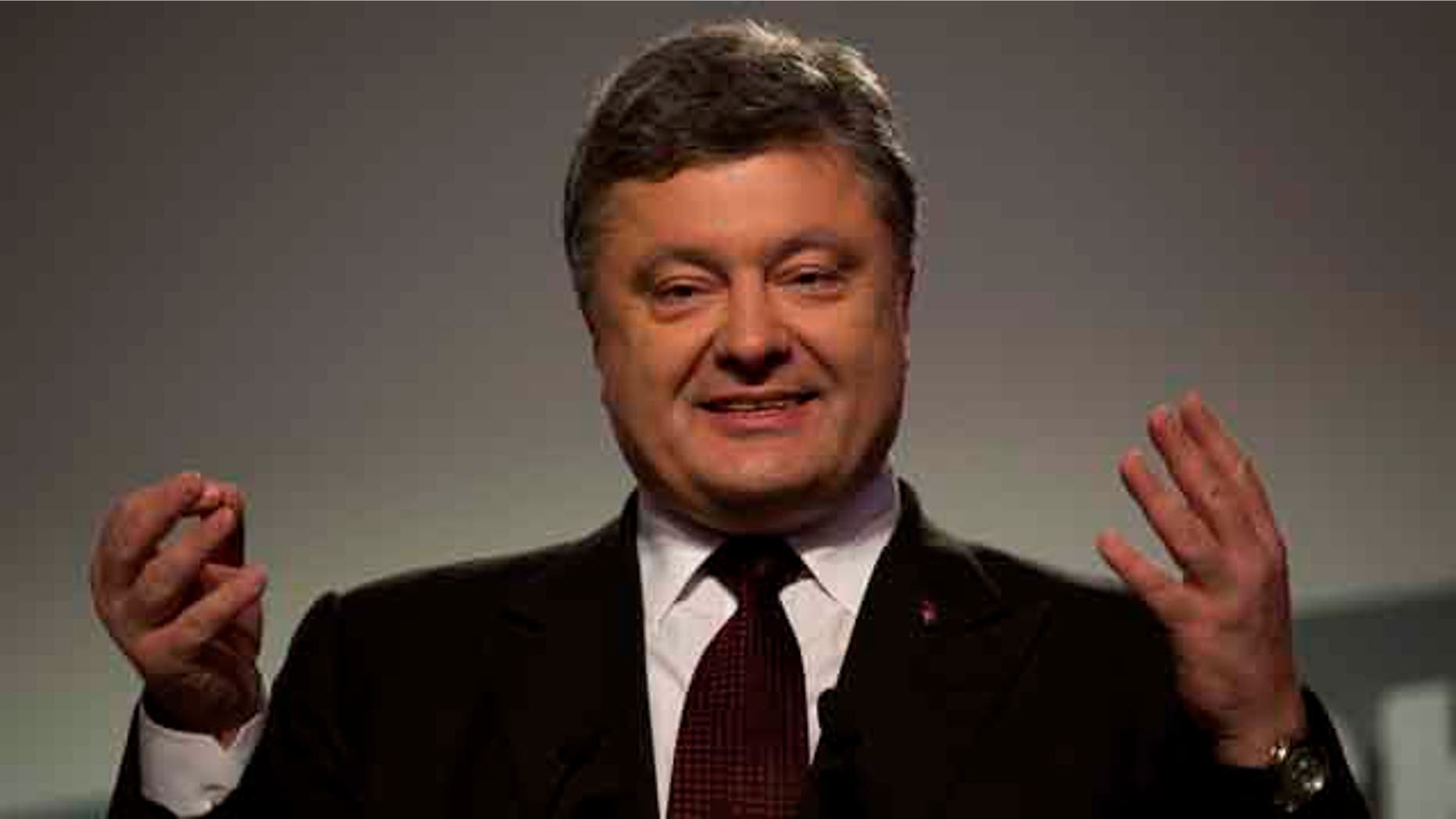 October 26, 2014: Ukrainian President Petro Poroshenko at a press conference following the parliamentary elections in Kiev. Exit polls indicate Ukrainians overwhelmingly voted for several pro-Western parties in a landmark parliamentary election Sunday.