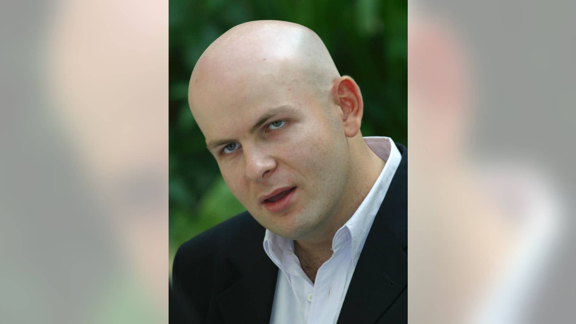 Mourners Honor Ukrainian Journalist Killed in Russian Captivity
