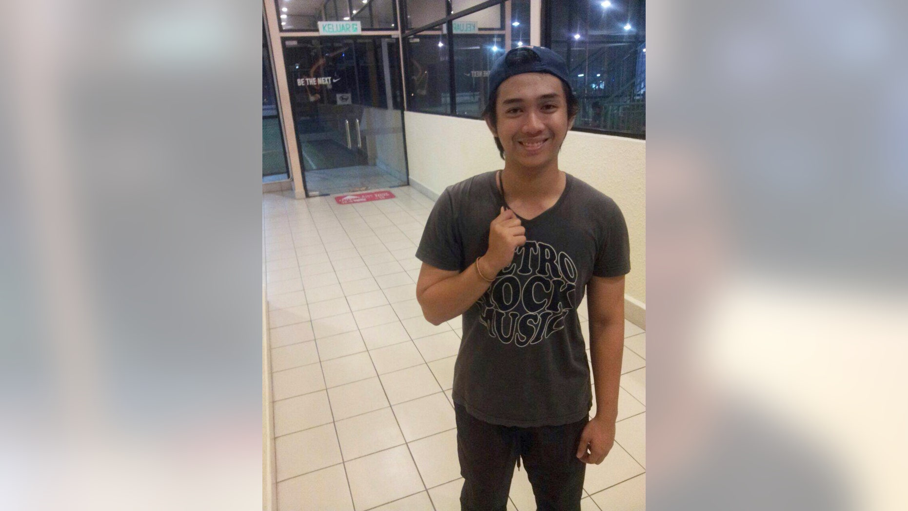 This undated photo, provided by Khairil Azwan, shows Mohammad Afif. Afif, 19, was killed along with his parents and three siblings when Flight 17 was shot down on July 17. Afif's friends described him as someone who was always able to lift people's spirits. (AP Photo/Khairil Azwan)