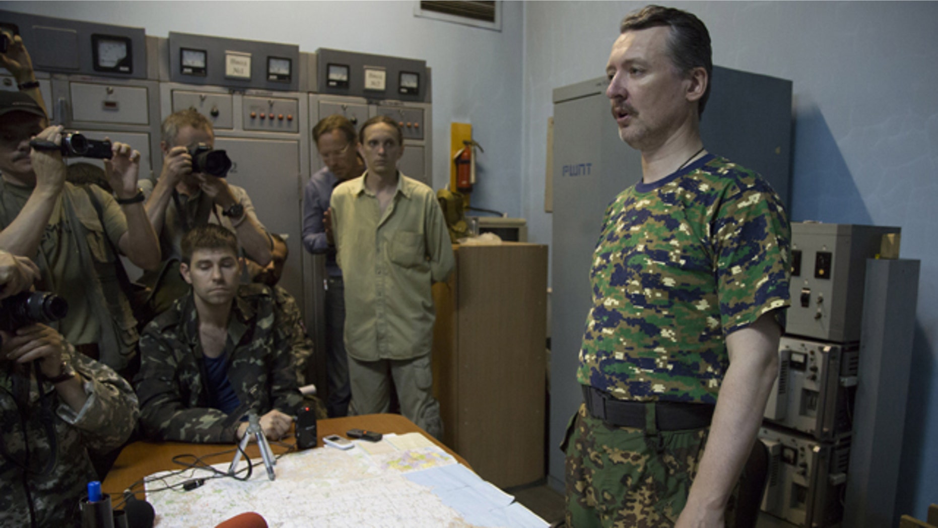 July 28, 2014: Igor Strelkov, a pro-Russian rebel commander, speaks to the media in the city of Donetsk, eastern Ukraine. (AP Photo/Dmitry Lovetsky)
