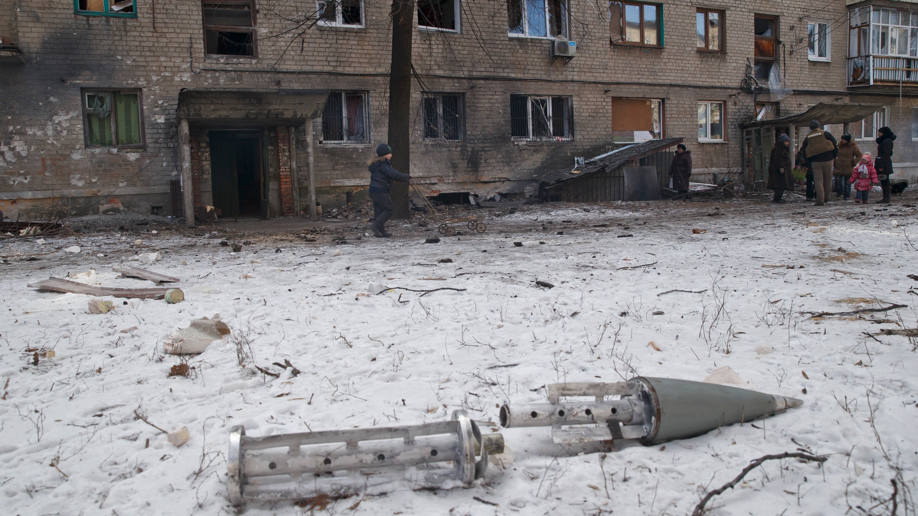 Feb. 20, 2015 - The remains of a rocket outside damaged apartment building in Debaltseve, Ukraine. After weeks of relentless fighting, Debaltseve fell Wednesday to Russia-backed separatists.