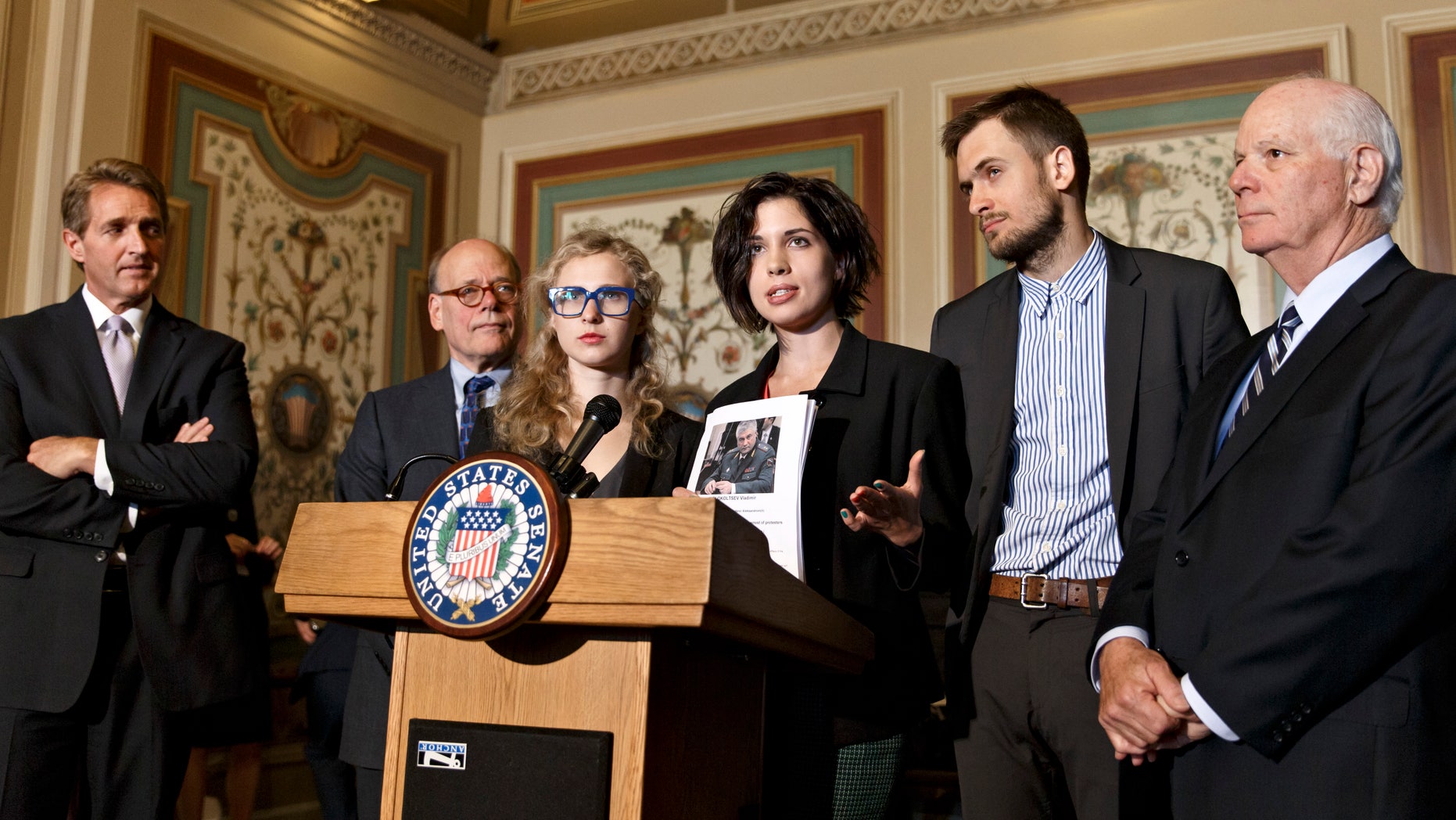 May 6, 2014: Russian political activists Nadya Tolokonnikova, center, and Maria Alyokhina, center left, of the Russian punk band Pussy Riot, join Sen. Ben Cardin, D-Md., far right, the chairman of the Helsinki Commission, Sen. Jeff Flake, R-Ariz., far left, and Rep. Steve Cohen, D-Tenn., second from left, in seeking action to stop violations of human rights by pro-Russian militants in the Ukraine region.