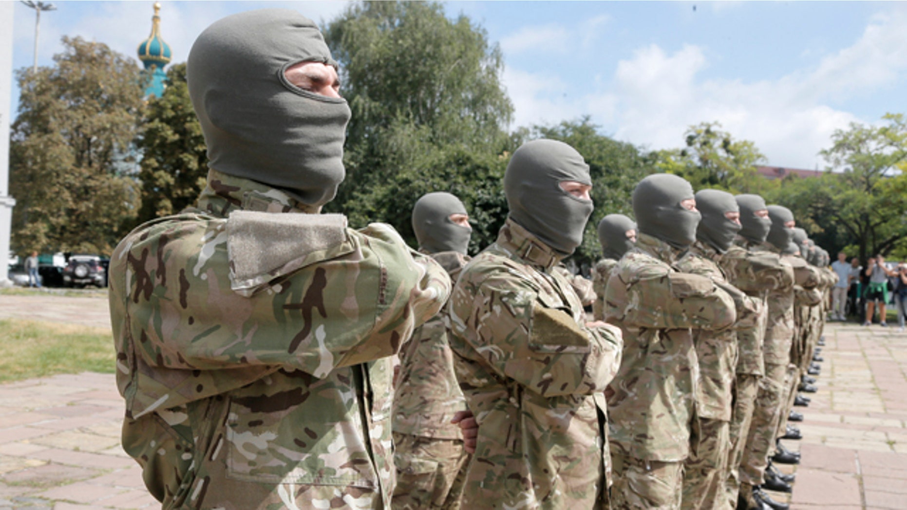 August 17, 2014: Volunteers take an oath of allegiance to Ukraine, before being sent to the eastern part of Ukraine to join the ranks of special battalion 'Azov' fighting against pro-Russian separatists. (AP Photo/Efrem Lukatsky)