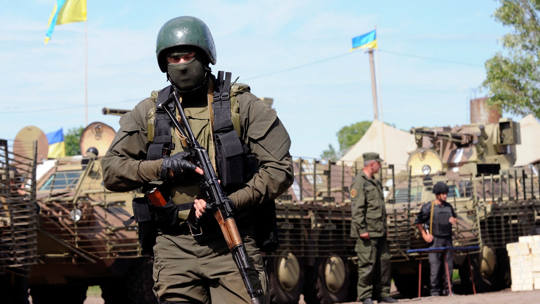 Ukrainian servicemen are pictured at the military camp near the town of Svyatogorsk in Eastern Ukraine, June 20, 2014.