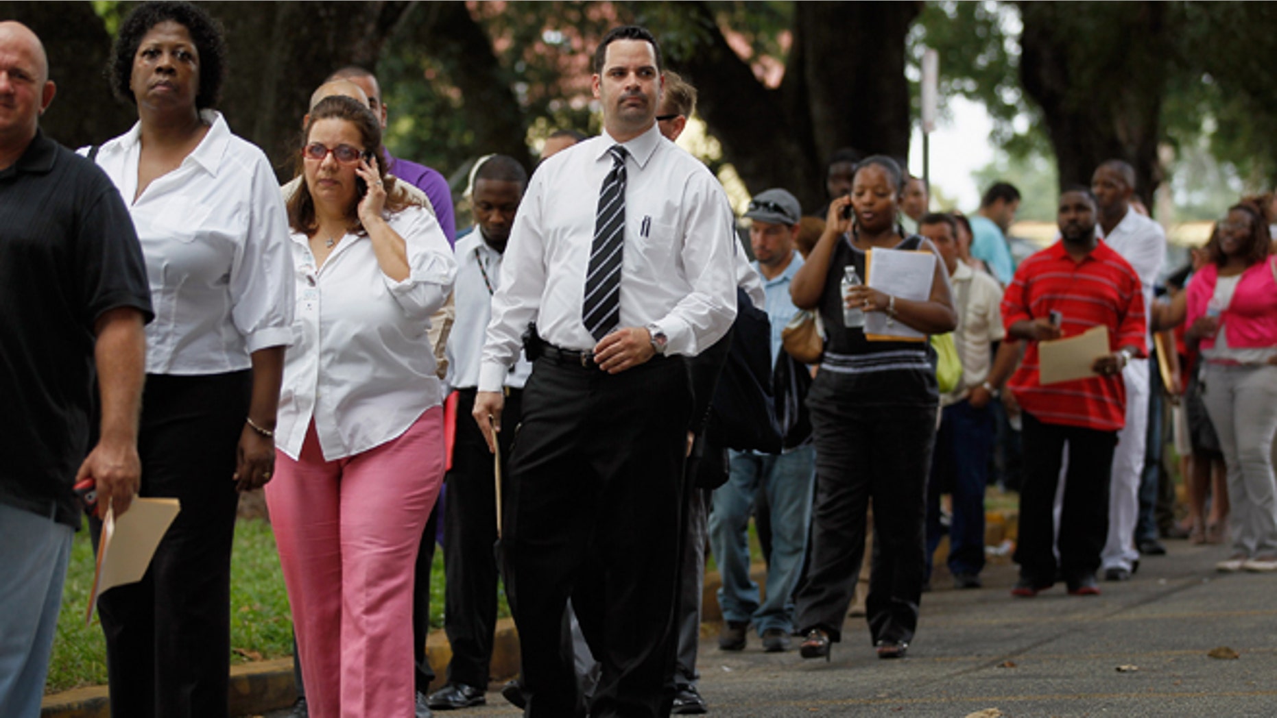 MIAMI, FL - NOVEMBER 15: Job seekers line up to apply for an opening with Major League Baseball's Miami Marlins on November 15, 2011 in Miami, Florida. (Photo by Joe Raedle/Getty Images)