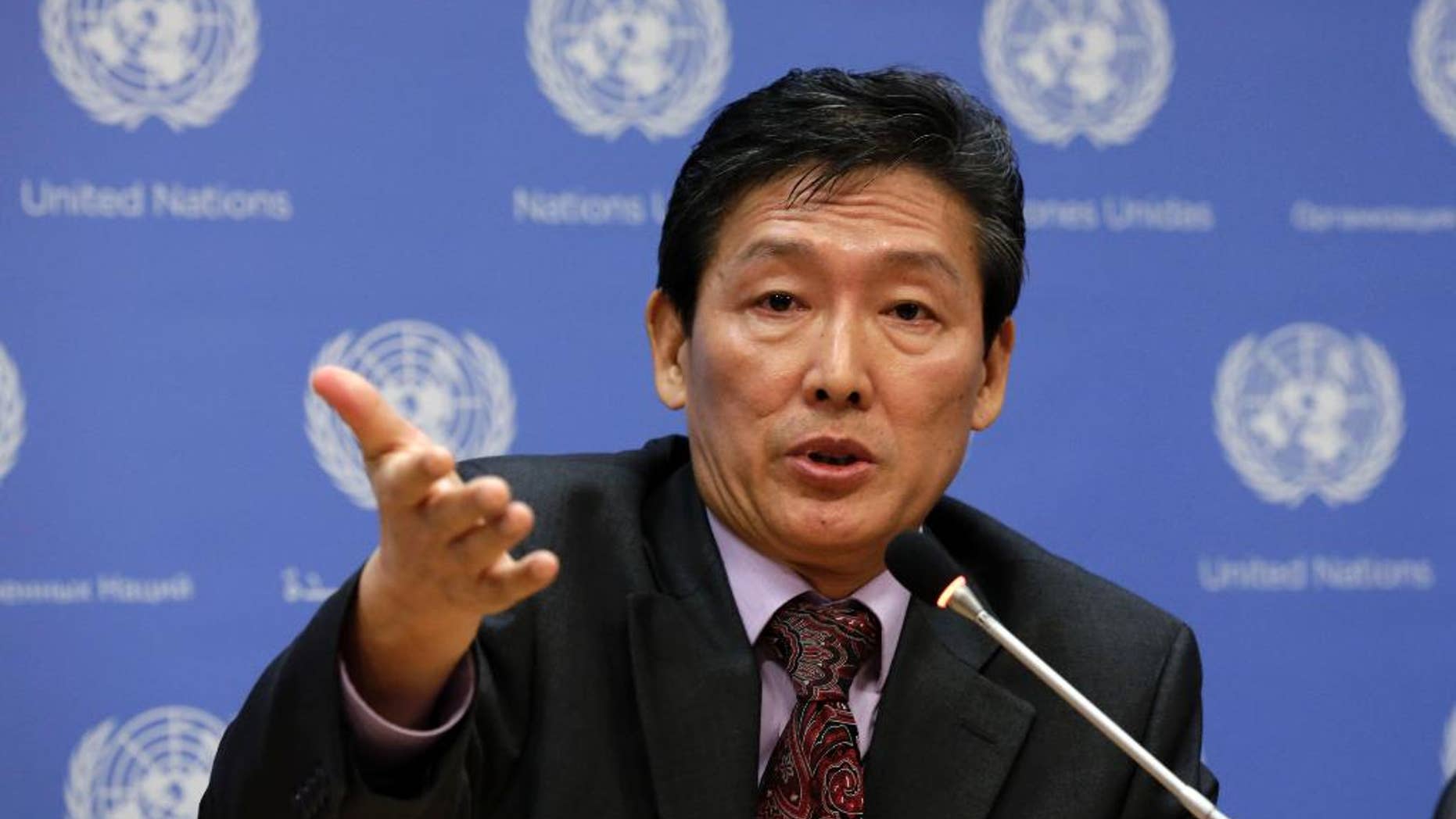 FILE - In this March 24, 2014, file photo, North Korea's deputy U.N. ambassador Ri Tong Il, responds to a question during his news conference at United Nations headquarters. North Korea publicly acknowledged the existence of its labor camps for the first time Tuesday, Oct. 7, an admission that appeared to come in response to a highly critical U.N. human rights report earlier this year. The deputy U.N. ambassador said the secretary of his country's ruling Workers' Party had visited the EU, and that "we are expecting end of this year to open political dialogue between the two sides." The human rights dialogue would follow. (AP Photo/Richard Drew, File)