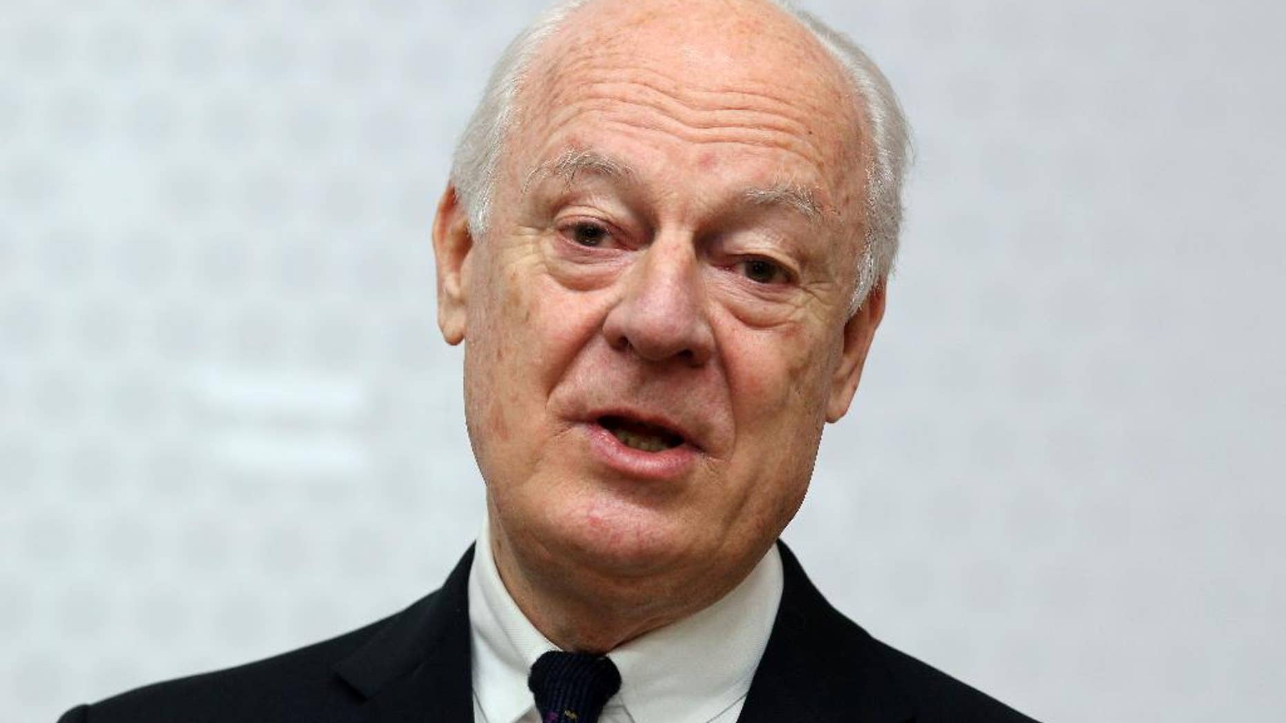 FILE - In this Feb. 13, 2015, file photo, UN Special Envoy for Syria Staffan de Mistura informs the media after talks with Austrian Foreign Minister Sebastian Kurz at the foreign ministry in Vienna, Austria. The United Nations envoy to Syria said Tuesday, Feb. 17, he has received a commitment from the Syrian government to suspend airstrikes and artillery shelling on the city of Aleppo for six weeks to allow a proposed U.N. plan to "freeze" hostilities in the country's largest city to be tested. (AP Photo/Ronald Zak, File)