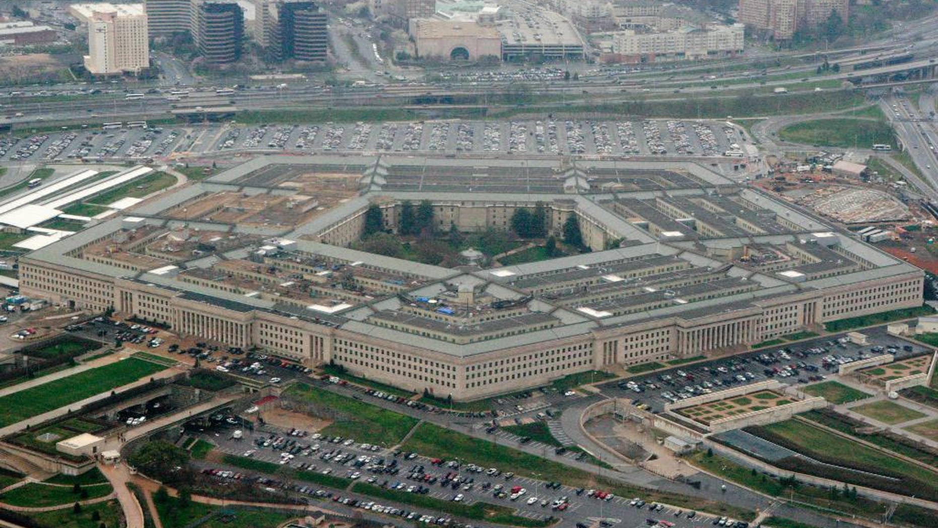 FILE - This March 27, 2008, aerial file photo shows the Pentagon in Washington. The U.S. is protesting an intercept of a U.S. reconnaissance plane by a Russian fighter jet last week, calling it "unsafe and unprofessional" amid what it views as increasingly aggressive air operations by Moscow. Pentagon spokesman Mark Wright on Sunday, April 12, 2015, said the U.S. was filing a complaint to Russia after the April 7 incident over the Baltic Sea. (AP Photo/Charles Dharapak, File)