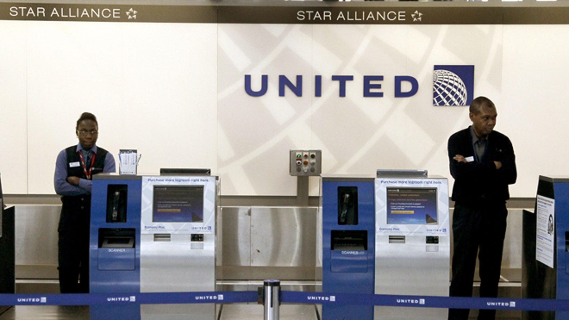 Nov. 15, 2012: United Airlines ticketing agents wait for passengers at Chicago's O'Hare International Airport.