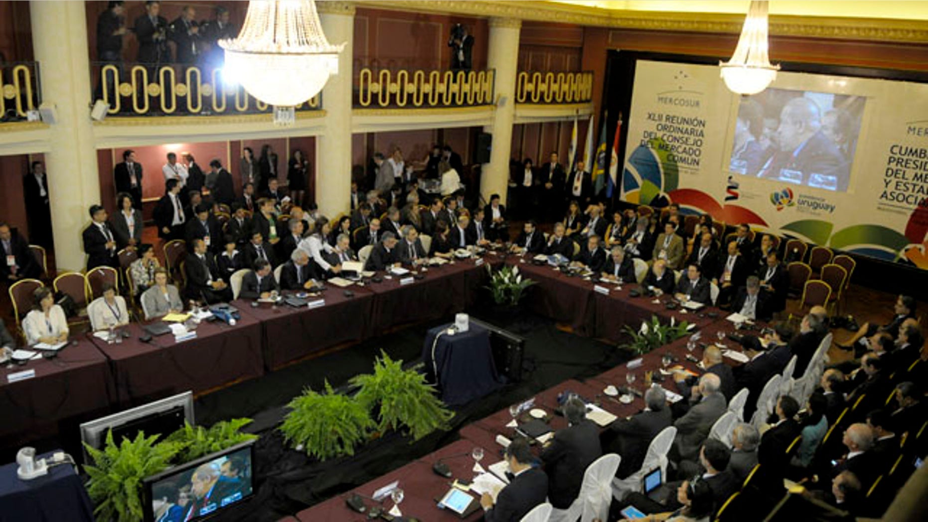 Leaders attend the Mercosur summit in Montevideo, Uruguay,Tuesday, Dec. 20, 2011. South America's Mercosur trade bloc approved a Palestinian free trade deal Tuesday and then pushed to admit Venezuela as a full member, even at the cost of threatening its founding principles. (AP Photo/Matilde Campodonico)