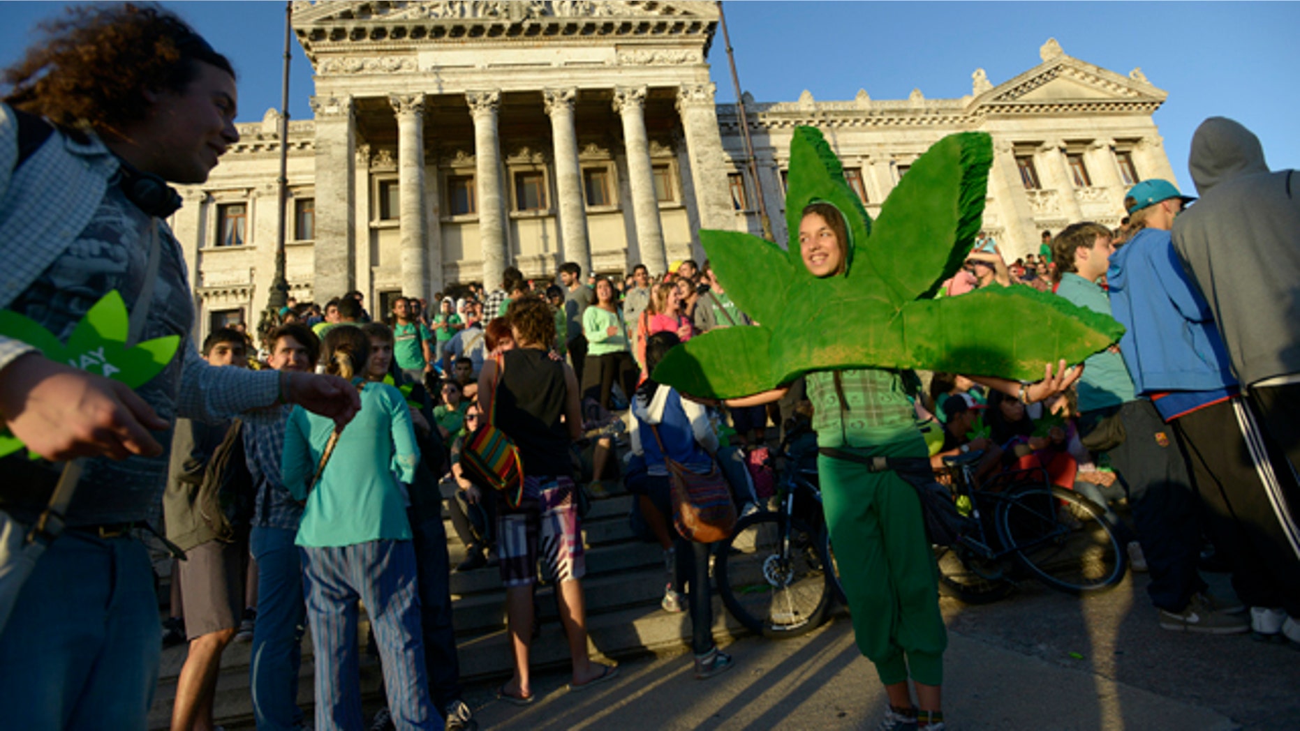 Dec. 10, 2013: People attend a demonstration in support of the legalization of marijuana outside the Congress in Montevideo, Uruguay.