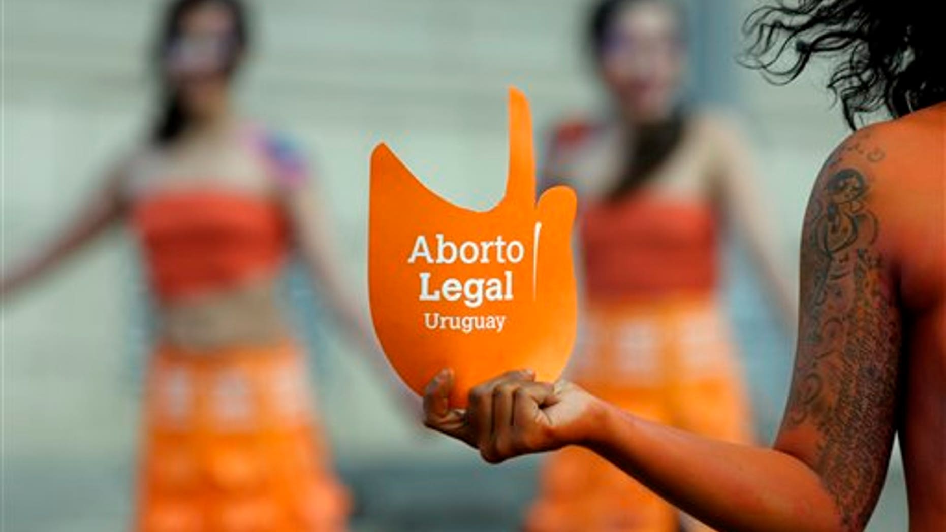 Pro-abortion activists demonstrate in front of the Uruguayan Congress in Montevideo, Uruguay.