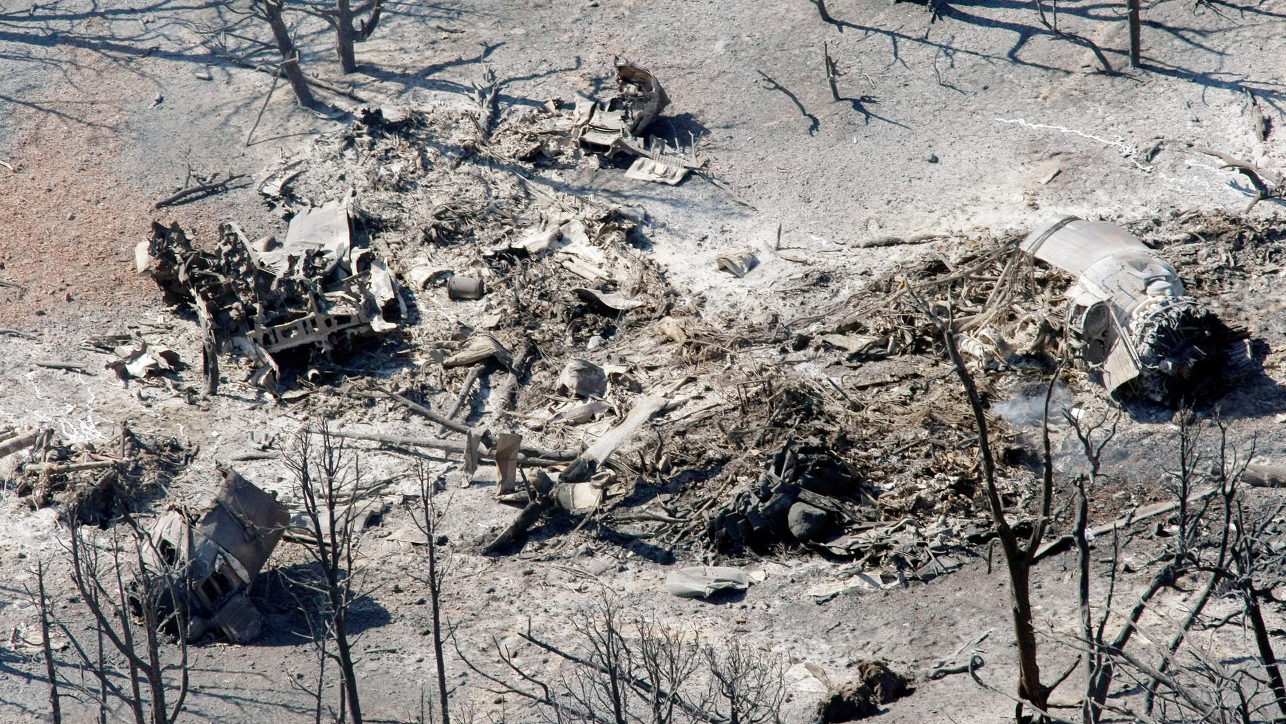 June 4, 2012: The crash scene of a heavy air tanker is seen from the air near Hamblin Valley Utah. The P2v Heavy air tanker crashed Sunday afternoon, June 3, as it dropped retardant on a 5,000-acre wildfire, killing pilots Todd Neal Tompkins and Ronnie Edwin Chambless, both of Boise, Idaho.