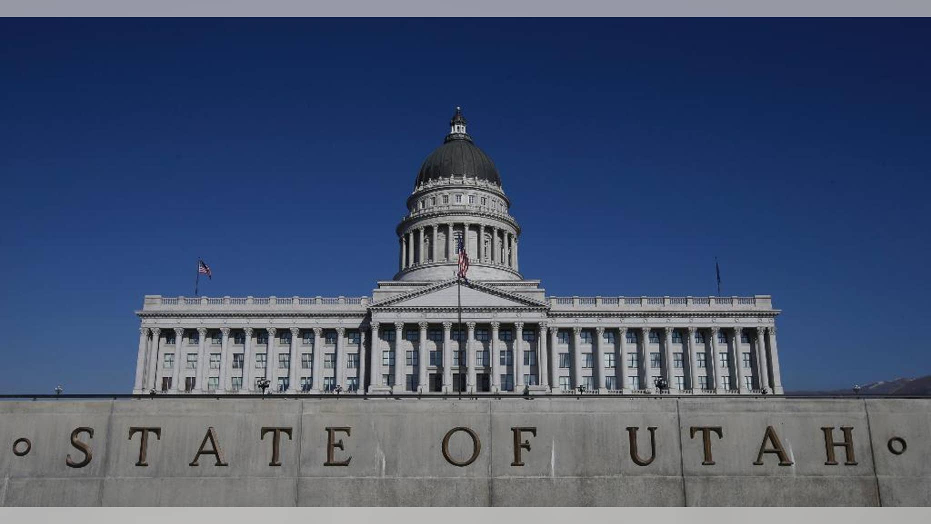 FILE - In this Jan. 26, 2015, file photo, shows the Utah State Capitol, in Salt Lake City. Utah became the only state to allow firing squads for executions Monday, March 23, 2015, when Gov. Gary Herbert signed a law approving the controversial method's use when no lethal-injection drugs are available. Herbert has said he finds the firing squad "a little bit gruesome," but Utah is a capital punishment state and needs a backup execution method in case a shortage of the drugs persists. (AP Photo/Rick Bowmer, File)