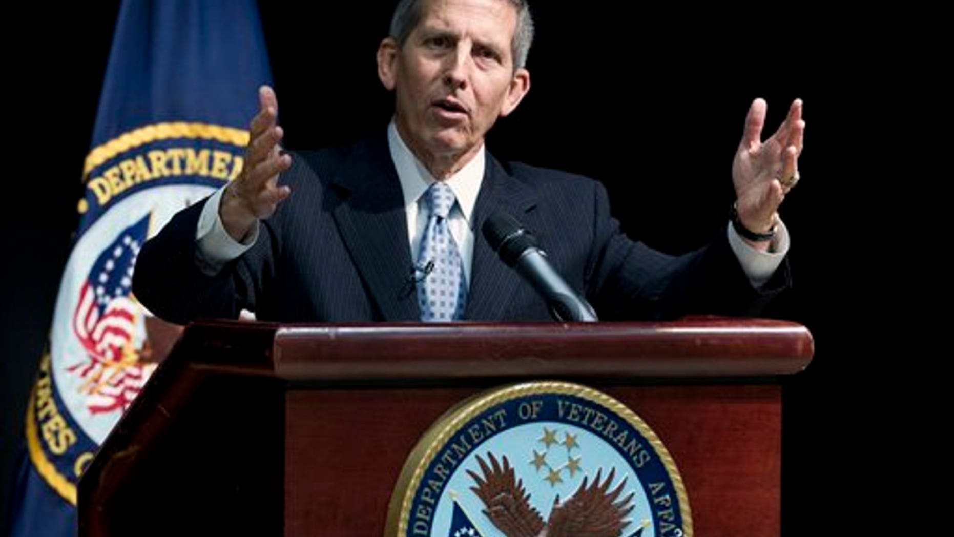 Acting Veterans Affairs Secretary Sloan Gibson speaks during a news conference at the VA Medical Center in Washington, Wednesday, June 18, 2014. The Veterans Affairs Department (VA) release the results from its Nationwide Access Audit, along with facility level patient access data for all Veterans health facilities. (AP Photo/Jose Luis Magana)